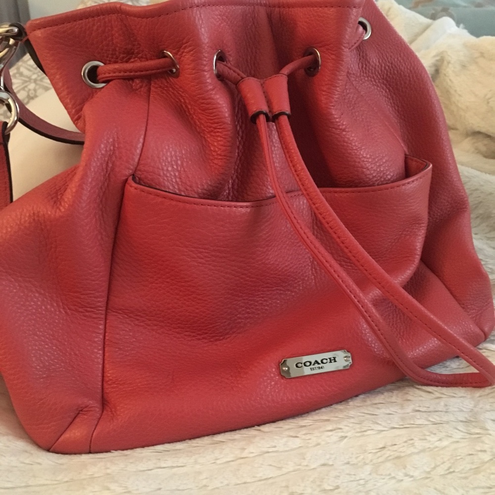 Coral crossbody Coach bag